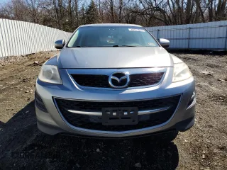 2011 Mazda CX-9 Touring z VIN JM3TB3CV6B0331966, wystawiony jako Copart lot #49517875 z przebiegiem 184 011 mil mil oraz Czysty tytuł • Clean title. Historia ofert i sprzedaży dostępna na DreamBid. Obrazek 5.