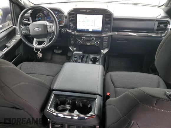 2021 Ford F-150 XL with VIN 1FTFW1E87MFC00633, listed as a Copart auction lot 65318235 with 91,264 mi miles and Salvage title. Bid and sale history available at DreamBid. Image 8.