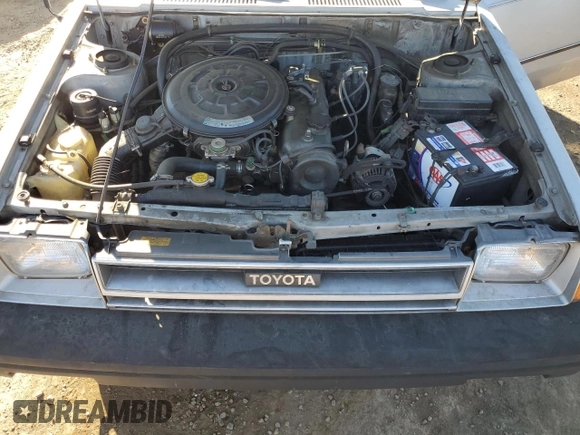 1986 Toyota Tercel z VIN JT2AL31G5G0429131, wystawiony jako Copart lot #79204554 z przebiegiem 124 477 mil mil oraz Szkoda całkowita • Salvage title. Historia ofert i sprzedaży dostępna na DreamBid. Obrazek 11.