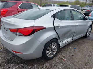 2015 Hyundai Elantra SE with VIN 5NPDH4AEXFH599545, listed as a IAAI auction lot 42017312 with 151,453 mi miles and . Bid and sale history available at DreamBid. Image 4.