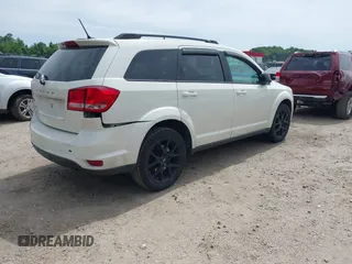 2014 Dodge Journey SXT z VIN 3C4PDCBBXET135001, wystawiony jako IAAI lot #42318360 z przebiegiem 152 321 mil mil oraz . Historia ofert i sprzedaży dostępna na DreamBid. Obrazek 4.