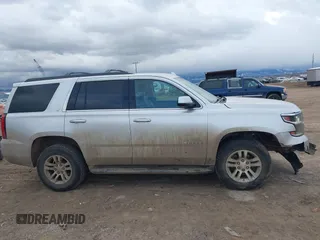 2019 Chevrolet Tahoe LT with VIN 1GNSKBKC7KR175468, listed as a IAAI auction lot 41680274 with 159,155 mi miles and . Bid and sale history available at DreamBid. Image 14.