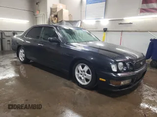 1997 Nissan Maxima with VIN HBY33200347, listed as a Copart auction lot 47182085 with 173,662 mi miles and Salvage title. Bid and sale history available at DreamBid. Image 4.