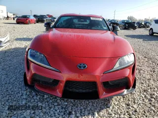 2021 Toyota GR Supra 2.0 with VIN WZ1DB2C0XMW043722, listed as a Copart auction lot 82909334 with 0 mi miles and Salvage Title. Bid and sale history available at carsss.com. Image 5.