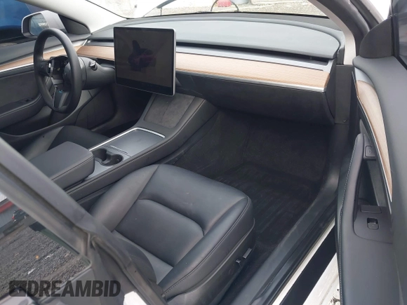 2023 Tesla Model 3 with VIN 5YJ3E1EA2PF612427, listed as a IAAI auction lot 41793756 with 17,913 mi miles and . Bid and sale history available at carsss.com. Image 5.