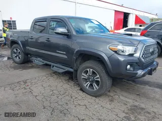 2019 Toyota Tacoma 4WD SR5 with VIN 3TMDZ5BN7KM073069, listed as a IAAI auction lot 41652535 with 55,019 mi miles. Bid and sale history available at carsss.com. Image 1.