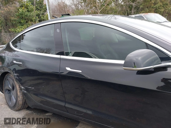 2019 Tesla Model 3 Mid Range with VIN 5YJ3E1EA3KF313425, listed as a IAAI auction lot 41806388 with 110,767 mi miles and . Bid and sale history available at carsss.com. Image 13.