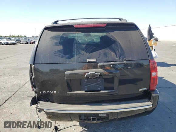 2009 Chevrolet Tahoe LTZ with VIN 1GNFK33089R139455, listed as a Copart auction lot 58953995 with 176,029 mi miles and Salvage title. Bid and sale history available at DreamBid. Image 6.