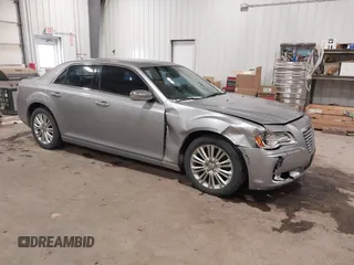2013 Chrysler 300 with VIN 2C3CCAKT6DH645307, listed as a IAAI auction lot 41512163 with 154,225 mi miles. Bid and sale history available at carsss.com. Image 1.