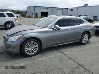 2012 Infiniti M with VIN JN1AY1AP4CM530115, listed as a Copart auction lot 54873105 with 155,596 mi miles and Salvage title. Bid and sale history available at DreamBid. Image 1.