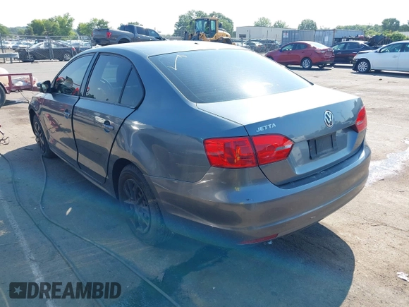 2014 Volkswagen Jetta S with VIN 3VW2K7AJ8EM231345, listed as a IAAI auction lot 42583321 with 129,988 mi miles and . Bid and sale history available at DreamBid. Image 3.
