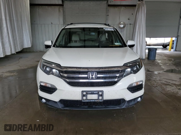 2018 Honda Pilot EX-L with VIN 5FNYF6H58JB040611, listed as a Copart auction lot 63614525 with 148,656 mi miles and Salvage title. Bid and sale history available at DreamBid. Image 5.