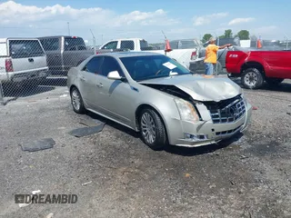 2013 Cadillac CTS Premium z VIN 1G6DS5E37D0104876, wystawiony jako IAAI lot #41916448 z przebiegiem 110 139 mil mil oraz . Historia ofert i sprzedaży dostępna na DreamBid. Obrazek 1.