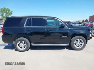 2015 Chevrolet Tahoe LS with VIN 1GNSCAKC5FR645736, listed as a IAAI auction lot 42064623 with 223,149 mi miles and . Bid and sale history available at DreamBid. Image 14.