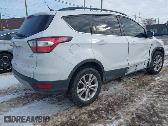2018 Ford Escape SE with VIN 1FMCU0GD1JUC48757, listed as a IAAI auction lot 41631583 with 80,700 mi miles. Bid and sale history available at carsss.com. Image 4.