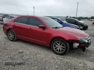 2012 Ford Fusion SEL z VIN 3FAHP0JG2CR309554, wystawiony jako Copart lot #60869895 z przebiegiem 199 134 mil mil oraz Szkoda całkowita • Salvage title. Historia ofert i sprzedaży dostępna na DreamBid. Obrazek 4.