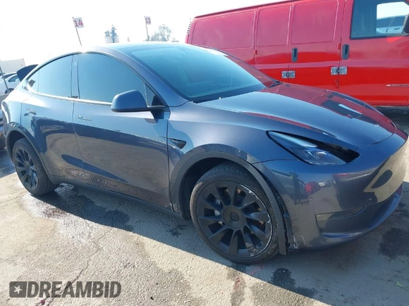 2022 Tesla Model Y Long Range z VIN 7SAYGDEE4NF522698, wystawiony jako IAAI lot #41287885 z przebiegiem 82 306 mil mil oraz . Historia ofert i sprzedaży dostępna na DreamBid. Obrazek 1.