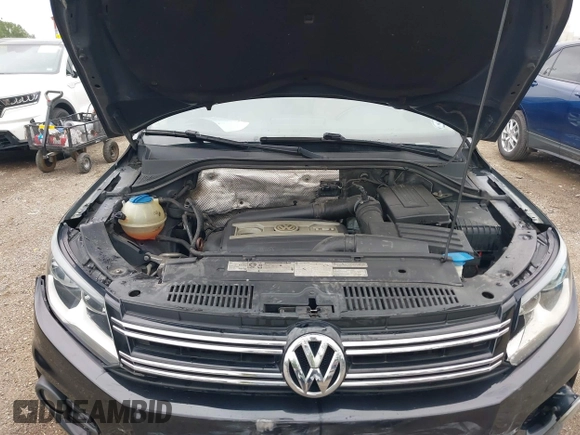 2012 Volkswagen Tiguan SE z VIN WVGBV7AX0CW558863, wystawiony jako IAAI lot #42285870 z przebiegiem 158 521 mil mil oraz . Historia ofert i sprzedaży dostępna na DreamBid. Obrazek 10.