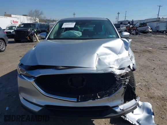 2019 Mazda CX-5 Sport with VIN JM3KFBBM7K0668830, listed as a IAAI auction lot 42069505 with Not Provided miles and . Bid and sale history available at DreamBid. Image 11.