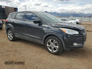2015 Ford Escape SE with VIN 1FMCU9G96FUC65061, listed as a Copart auction lot 53571625 with 129,048 mi miles and Salvage Title. Bid and sale history available at carsss.com. Image 4.
