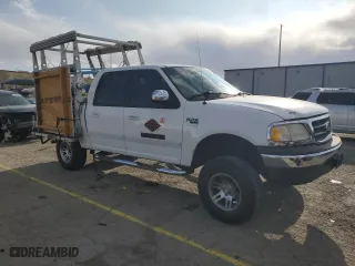 2001 Ford F-150 SuperCrew XLT with VIN 1FTRW07L41KD95909, listed as a Copart auction lot 51649305 with 181,017 mi miles and Salvage Title. Bid and sale history available at carsss.com. Image 4.