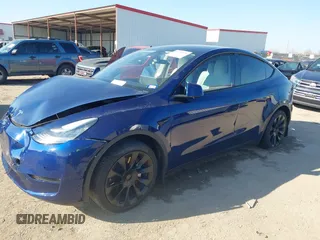 2021 Tesla Model Y Standard Range with VIN 5YJYGDED5MF121874, listed as a IAAI auction lot 41238170 with 72,041 mi miles and . Bid and sale history available at DreamBid. Image 17.