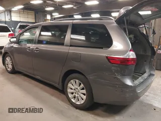 2015 Toyota Sienna XLE with VIN 5TDYK3DC3FS677780, listed as a IAAI auction lot 42155459 with 102,355 mi miles. Bid and sale history available at carsss.com. Image 3.