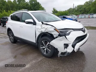 2018 Toyota RAV4 XLE z VIN 2T3WFREVXJW444968, wystawiony jako IAAI lot #42299924 z przebiegiem 99 906 mil mil oraz . Historia ofert i sprzedaży dostępna na DreamBid. Obrazek 1.
