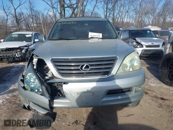 2003 Lexus GX 470 with VIN JTJBT20XX30015034, listed as a IAAI auction lot 41386690 with 234,983 mi miles. Bid and sale history available at carsss.com. Image 12.