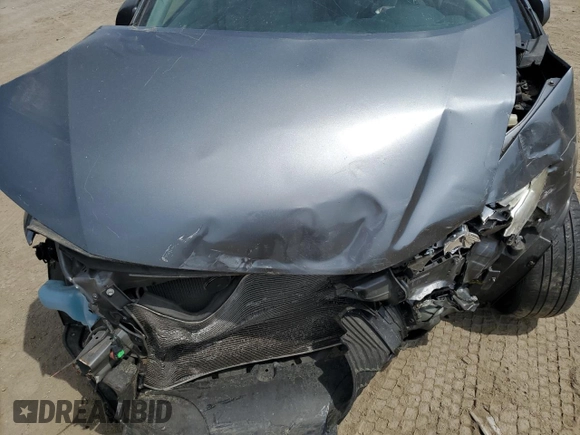 2012 Honda Insight z VIN JHMZE2H34CS006488, wystawiony jako Copart lot #54203575 z przebiegiem Nie podano mil oraz Szkoda całkowita • Salvage title. Historia ofert i sprzedaży dostępna na DreamBid. Obrazek 11.