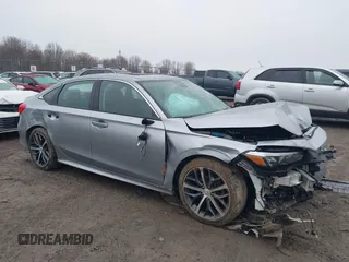 2024 Honda Civic Touring z VIN 2HGFE1F98RH317414, wystawiony jako IAAI lot #41982089 z przebiegiem 30 416 mil mil oraz . Historia ofert i sprzedaży dostępna na DreamBid. Obrazek 1.