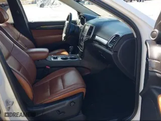 2012 Jeep Grand Cherokee Overland with VIN 1C4RJFCT0CC178071, listed as a IAAI auction lot 41825102 with 125,891 mi miles. Bid and sale history available at carsss.com. Image 5.