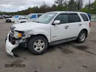 2011 Ford Escape Hybrid with VIN 1FMCU4K30BKB66313, listed as a Copart auction lot 58771165 with 297,214 mi miles and Salvage title. Bid and sale history available at DreamBid. Image 1.