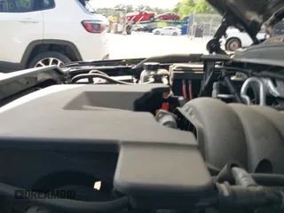 2018 Chevrolet Tahoe LT z VIN 1GNSKBKC7JR235456, wystawiony jako IAAI lot #42685297 z przebiegiem 92 816 mil mil oraz . Historia ofert i sprzedaży dostępna na DreamBid. Obrazek 19.