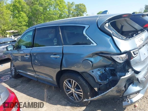 2019 Infiniti QX60 Luxe with VIN 5N1DL0MM7KC567051, listed as a IAAI auction lot 42065874 with 112,379 mi miles and . Bid and sale history available at DreamBid. Image 14.