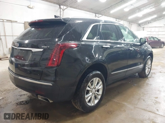 2022 Cadillac XT5 FWD Luxury with VIN 1GYKNAR47NZ100356, listed as a IAAI auction lot 42393314 with 91,492 mi miles and . Bid and sale history available at DreamBid. Image 4.