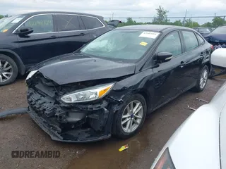 2017 Ford Focus SE z VIN 1FADP3F25HL253466, wystawiony jako IAAI lot #42303404 z przebiegiem 89 779 mil mil oraz . Historia ofert i sprzedaży dostępna na DreamBid. Obrazek 2.
