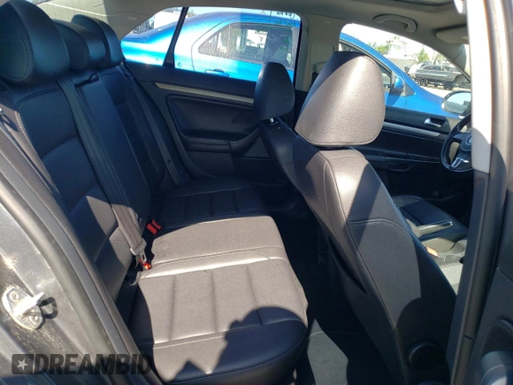 2010 Volkswagen Jetta SE z VIN 3VWRX7AJ4AM129714, wystawiony jako Copart lot #52975835 z przebiegiem 166 554 mil mil oraz Szkoda całkowita • Salvage title. Historia ofert i sprzedaży dostępna na DreamBid. Obrazek 10.