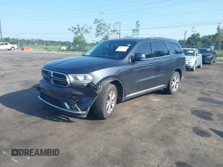 2014 Dodge Durango Limited with VIN 1C4RDHDG7EC483736, listed as a IAAI auction lot 42469233 with 265,842 mi miles and . Bid and sale history available at DreamBid. Image 2.