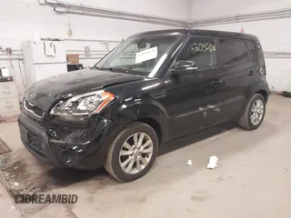 2012 Kia Soul + with VIN KNDJT2A60C7457882, listed as a IAAI auction lot 42050050 with 153,560 mi miles. Bid and sale history available at carsss.com. Image 2.