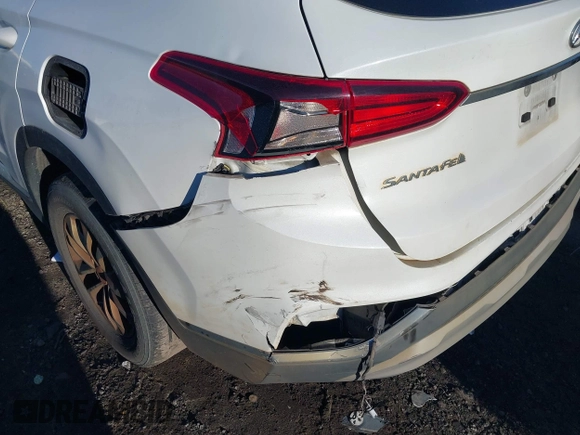 2019 Hyundai Santa Fe SE with VIN 5NMS2CAD6KH114027, listed as a IAAI auction lot 41874556 with 125,729 mi miles. Bid and sale history available at carsss.com. Image 20.