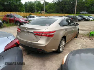 2013 Toyota Avalon XLE z VIN 4T1BK1EB6DU065481, wystawiony jako IAAI lot #42299194 z przebiegiem 220 763 mil mil oraz . Historia ofert i sprzedaży dostępna na DreamBid. Obrazek 4.