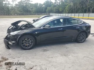2019 Tesla Model 3 Mid Range z VIN 5YJ3E1EA6KF394744, wystawiony jako Copart lot #55161345 z przebiegiem 77 262 mil mil oraz Nie do naprawy. Historia ofert i sprzedaży dostępna na DreamBid. Obrazek 1.