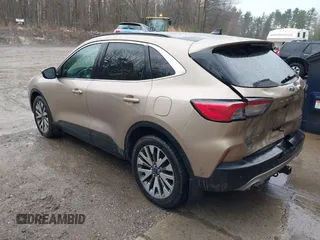 2021 Ford Escape Titanium Hybrid with VIN 1FMCU9DZXMUA66161, listed as a IAAI auction lot 41208651 with 61,198 mi miles and . Bid and sale history available at DreamBid. Image 16.