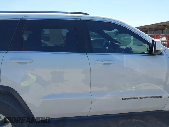 2021 Jeep Grand Cherokee Laredo E with VIN 1C4RJFAG5MC579865, listed as a IAAI auction lot 41818874 with 105,489 mi miles and . Bid and sale history available at DreamBid. Image 13.