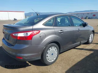 2012 Ford Focus SE with VIN 1FAHP3F26CL314852, listed as a IAAI auction lot 42162488 with 101,782 mi miles. Bid and sale history available at carsss.com. Image 4.