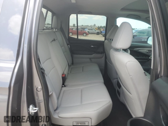 2022 Honda Ridgeline RTL z VIN 5FPYK3F51NB013101, wystawiony jako Copart lot #56360865 z przebiegiem 14 945 mil mil oraz Szkoda całkowita • Salvage title. Historia ofert i sprzedaży dostępna na DreamBid. Obrazek 10.
