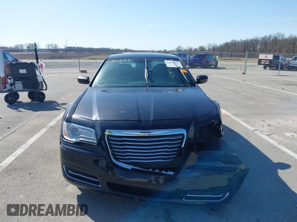2012 Chrysler 300 z VIN 2C3CCAAG8CH245879, wystawiony jako IAAI lot #41811243 z przebiegiem 177 634 mil mil oraz . Historia ofert i sprzedaży dostępna na DreamBid. Obrazek 13.