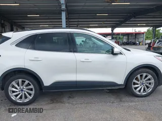 2021 Ford Escape Titanium with VIN 1FMCU9J93MUA36648, listed as a IAAI auction lot 42055229 with 122,864 mi miles and . Bid and sale history available at carsss.com. Image 13.