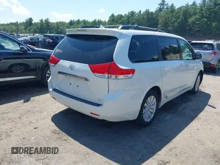 2012 Toyota Sienna XLE with VIN 5TDDK3DC5CS037659, listed as a IAAI auction lot 42541352 with 128,378 mi miles and . Bid and sale history available at DreamBid. Image 4.